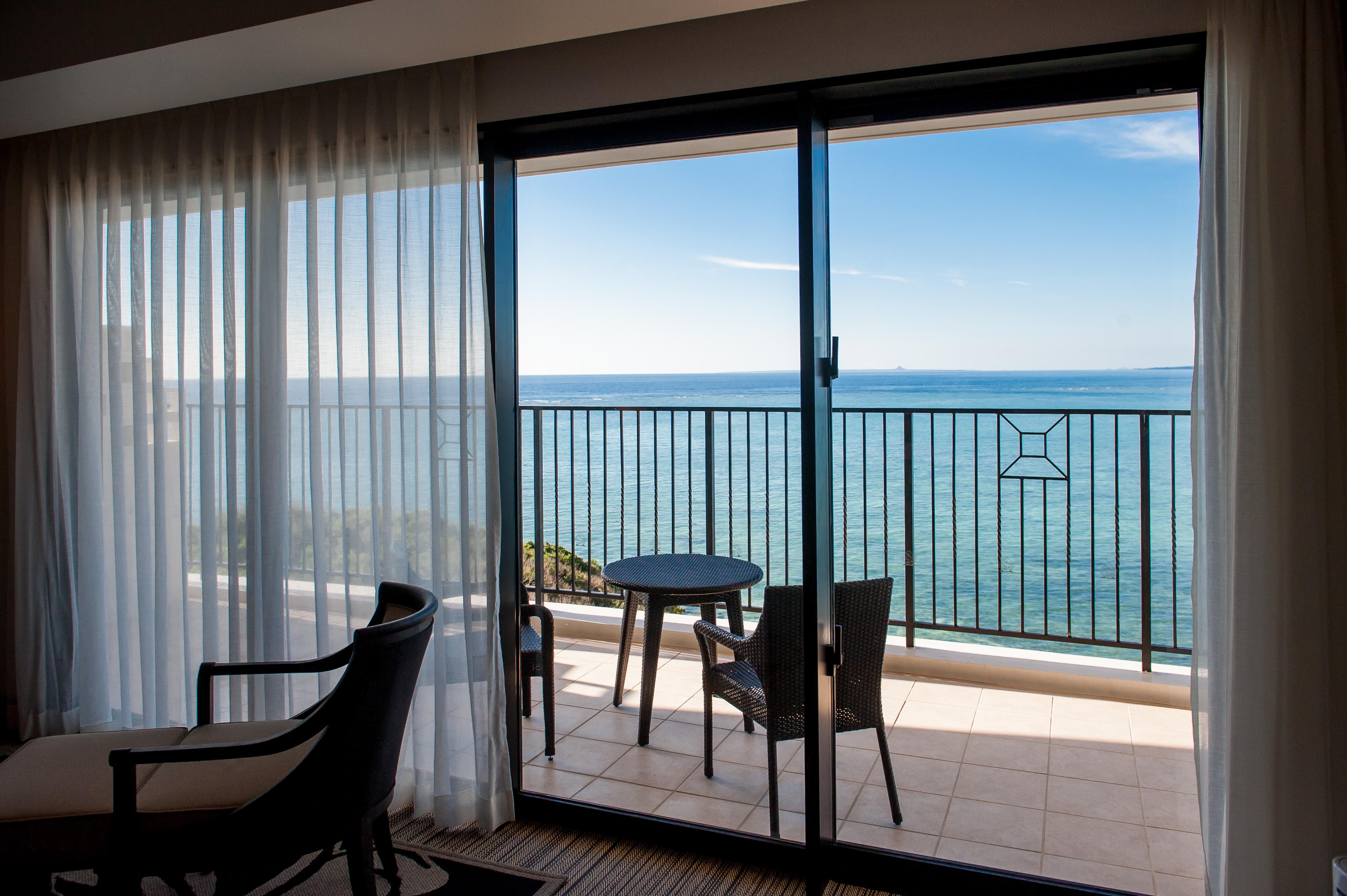 Hotel Monterey Okinawa Spa & Resort Onna Exterior photo A sliding door