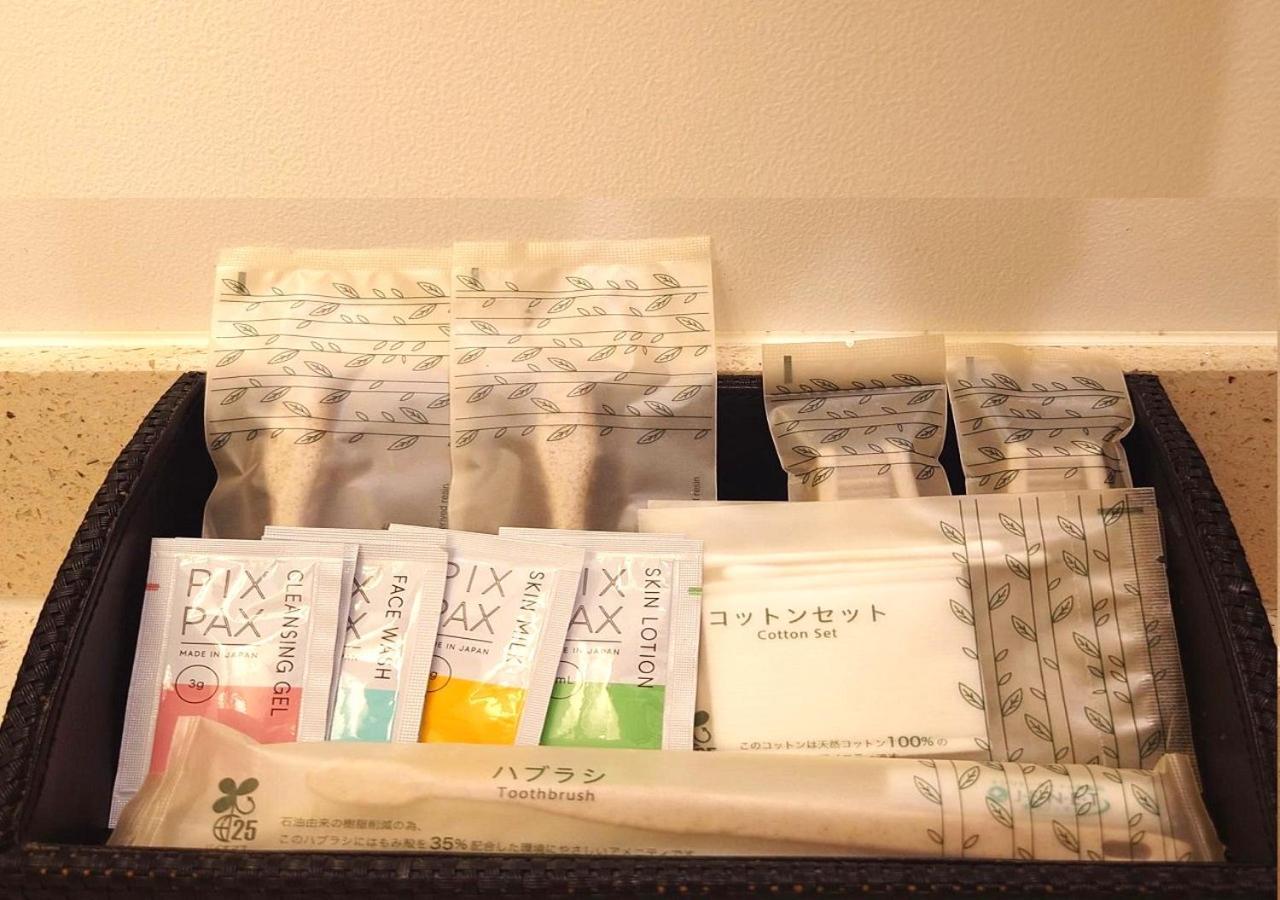 Hotel Monterey Okinawa Spa & Resort Onna Exterior photo A selection of toiletries in a hotel bathroom