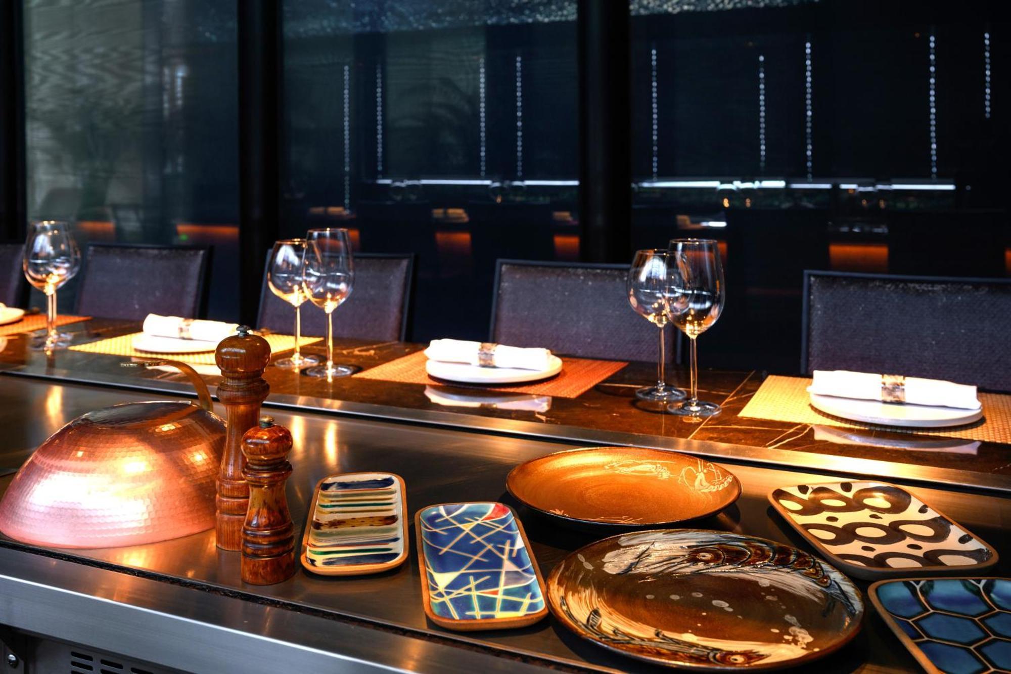 Hotel Monterey Okinawa Spa & Resort Onna Exterior photo A table at a restaurant