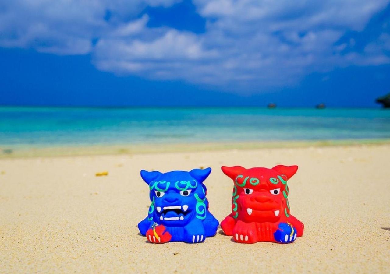 Hotel Monterey Okinawa Spa & Resort Onna Exterior photo Shisa statues on the beach of Okinawa